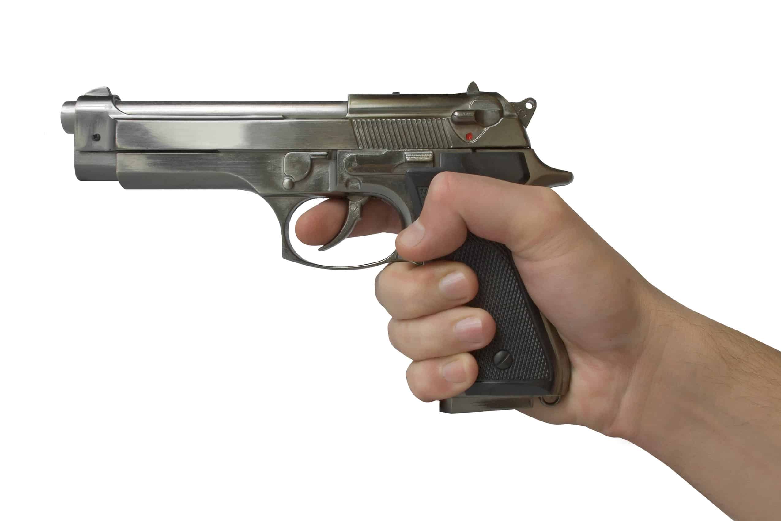 pistol in hand